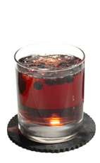 The Cassius drink recipe is made from Chymos crème de cassis, tonic water and black or red currant berries, and served over ice in a rocks glass.