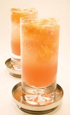 The Funky Diva Caipirinha recipe is an orange colored drink served best on a night out with your girlfriends trying to catch the attention of the guys. Made from Leblon cachaca, Aperol, Grand Marnier, blood orange, simple syrup and champagne, and served over ice in a highball glass.