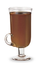 The Fuzzy Nut is a brown Christmas drink made from peach schnapps, amaretto and hot chocolate, and served in an Irish coffee glass.