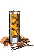 The Gingerbread is a refreshing orange Christmas drink made from Frangelico hazelnut liqueur, dark rum, cinnamon schnapps and ginger beer, and served over ice in a chocolate-rimmed highball glass.