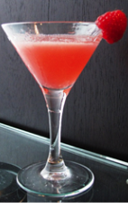 The Raspberry Ginger Gimlet is a red colored cocktail made form Effen raspberry vodka, lime juice, simple syrup, cranberry juice, ginger and raspberries, and served in a chilled cocktail glass.