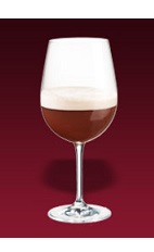 The Saisson Dubonnet cocktail is made from Dubonnet rouge, crème de cassis and Saison Dupont Belgian ale, and served in a large wine glass.