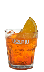 The Spritz drink recipe is an easy to make orange colored cocktail perfect for the light drinkers. Made from Volare Sprizzer aperitif liqueur, prosecco wine and club soda, and served over ice in a rocks glass garnished with an orange slice.