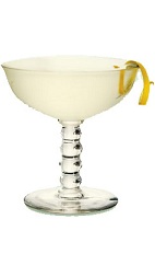 The St-Germain Martini is a clear colored cocktail made from gin, St-Germain elderflower liqueur and lemon, and served in a chilled cocktail glass.