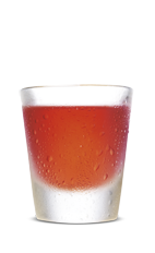 The Sweet Vengeance is an orange colored shot made from SoCo Fiery Pepper, orange juice and cranberry juice, and served in a chilled shot glass.