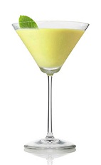 The So-Cal Cocktail is a yellow-green cocktail made from Patron tequila, lime juice, simple syrup, avocado and basil, and served in a chilled cocktail glass.