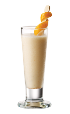 The Tuaca Cream Punch is a cream colored shot made from Tuaca vanilla citrus liqueur, heavy cream, vanilla liqueur, cayenne pepper and agave nectar, and served in a tall shot glass.