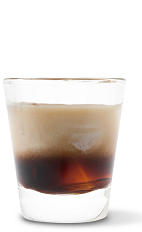 The UV White Russian cocktail recipe is made from UV Espresso vodka and half-and-half, and served over ice in a rocks glass.