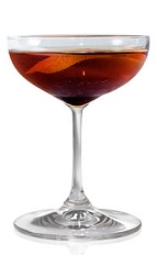 The Alcachofa is an orange cocktail made from Patron Reposado tequila, sweet vermouth and orange bitters, and served in a chilled cocktail glass.