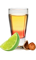 The Astro Shot is a relaxing orange shot made from Frangelico hazelnut liqueur, lime juice and grenadine, and served in a chilled shot glass.