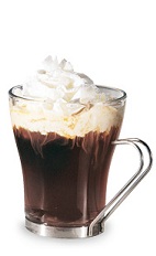 The Butter Tumble is a brown drink made from butterscotch schnapps, dark creme de cacao, coffee and whipped cream, and served in a warm coffee glass.