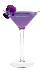 The Cointreau Teese cocktail is a beautiful soft purple drink, made from Cointreau orange liqueur, apple juice, Monin violet syrup and lemon juice, and served in a chilled cocktail glass.