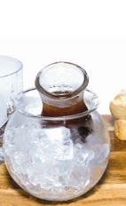 The Corretto on the Rocks drink recipe is made from Luxardo sambuca, coffee liqueur, orgeat syrup and lemon bitters, and served over ice in a rocks glass.