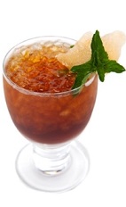 The Fernet Frappe cocktail recipe is made from Luxardo Fernet herbal liqueur, King's Ginger liqueur, cola and lemon, and served over crushed ice in a stemmed glass garnished with mint and candied ginger.