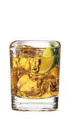 The Ginger Root Beer is an orange colored drink made from Smirnoff Root Beer vodka, ginger ale, club soda and lime, and served over ice in a rocks glass.
