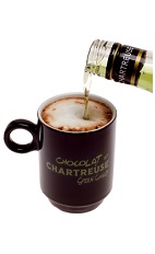 The Green Chaud is a warm brown drink made from Green Chartreuse and hot chocolate, and served in a warm coffee mug.