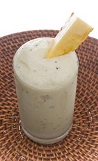 The Kiwi Pineapple Batida is a frozen drink recipe made from Leblon cachaca, condensed milk, kiwi fruit and pineapple, and served blended in a highball glass.