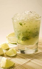 The Mint Caipirinha cocktail recipe is made from Leblon Cachaca, mint, lime juice and sugar, and served over crushed ice in a rocks glass.