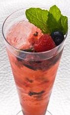 The Mixed Berry Mojito Caipirinha is a Brazilin version of the classic Mojito drink recipe. A red colored cocktail made from Leblon cachaca, mint, lime, brown sugar and berries, and served over ice in a highball glass.