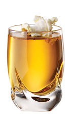 The Movie Night is an orange colored shot made from Tuaca vanilla citrus liqueur, butterscotch schnapps, salt and popcorn, and served in a chilled shot glass.