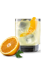 The Orange Sierra Margarita is a refreshing and light orange colored margarita made from Sierra tequila, lime juice and agave nectar, and served over ice in a rocks glass.