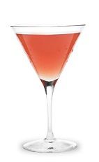 The Strawberry Tease Martini is a peach colored cocktail made from strawberry schnapps, peach schnapps and peach vodka, and served in a chilled cocktail glass.