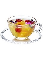 The Summer Punch is a light and fruity punch recipe for 10 guests made from Riesling wine, maraschino liqueur, ginger liqueur, oranges, pineapple and raspberries, and served from a punch bowl.