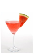 The Watermelon Mist cocktail recipe is a red colored drink made from Boca Loca cachaca, watermelon, agave nectar, cucumber and ginger ale, and served in a chilled cocktail glass.