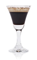 The Xocoa is a brown cocktail made from Patron XO Cafe liqueur, chocolate syrup, vanilla syrup, cinnamon, cayenne pepper and coconut milk, and served in a chilled pousse cafe glass.