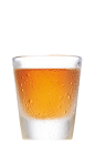 The Butter Comfort is an orange colored shot made from Southern Comfort and butterscotch schnapps, and served in a chilled shot glass.