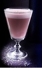 The Christmas Flip is a full bodied Christmas cocktail made in the traditional fashion. A pink colored cocktail made from cherry liqueur, almond milk, pimento dram and whole egg, and served in a chilled wine glass.