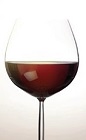 The June and Wine is a refreshing blend of Esprit de June floral liqueur and a good red wine, served in a red wine glass.