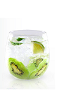 The Kiwi Lime is a clear colored drink made from Yeyo tequila, simple syrup, kiwi and lime, and served over ice in a rocks glass.