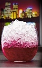 The O de Cassis is a dark red drink made from Joseph Cartron creme de cassis, beet juice, lemon juice and brown sugar, and served over crushed ice in a rocks glass.