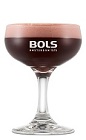 The Schwarwalder Coupe is a relaxing and flavor packed red cocktail perfect for Christmas or any holiday party. Made from Bols Barrel Aged Genever, dark creme de cacao and cranberry syrup, and served in a chilled cocktail glass or champagne coupe.