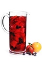 The Skinny Superfruit Sangria cocktail is a red colored drink recipe made from VeeV acai spirit, red wine, cranberry juice, strawberry puree, blueberries and orange, and served over ice in a rocks glass.