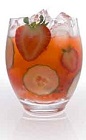 The Strawberry Basil Caipirinha drink recipe is a savory version of the classic Caipirinha. A red colored cocktail made from Leblon cachaca, strawberries, basil, lime and sugar, and served over ice in a rocks glass.