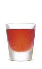 The Sweet Vengeance is an orange colored shot made from SoCo Fiery Pepper, orange juice and cranberry juice, and served in a chilled shot glass.