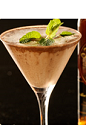 There's always room for ice cream, especially in your glass. The Too Full Flor Dessert cocktail recipe is made form Flor de Cana rum, Licor 43, chocolate ice cream, vanilla syrup and mint, and served in a chilled cocktail glass.