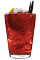 The Musta Marja drink recipe is made from Chymos blackberry liqueur and tonic water, and served over crushed ice in a highball glass garnished with a lemon wedge.