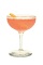 The Nomayo is a peach colored cocktail made from gin, St-Germain elderflower liqueur, Aperol, lemon juice and champagne, and served in a chilled cocktail glass.