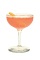 The Nomayo is a peach colored cocktail made from gin, St-Germain elderflower liqueur, Aperol, lemon juice and champagne, and served in a chilled cocktail glass.